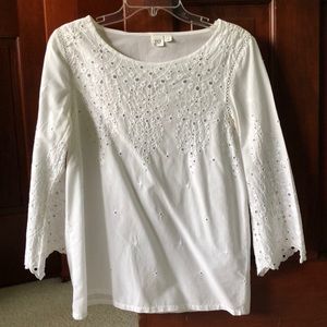 White blouse with eyelet details